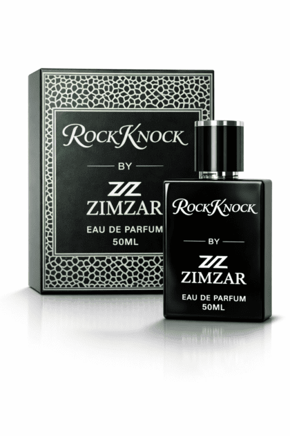 Create a professional product image using the raw reference image of the perfume bottle and box I provided. Place the bottle and box in a catchy, attractive style, with the bottle in front and the box behind or slightly angled so both are clearly visible. place both on somthing to make catchy look Use a plain pure white background with soft studio lighting and a light shadow under the products. Keep the original bottle and box design exactly the same, only improve the lighting and presentation. Make it look like high-quality commercial product photography, sharp focus, realistic reflections, no watermark, no extra objects.